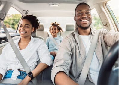 family in car