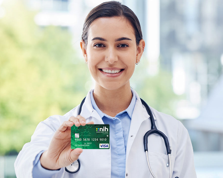 nurse holding credit card