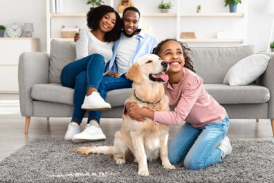 Young family and their dog