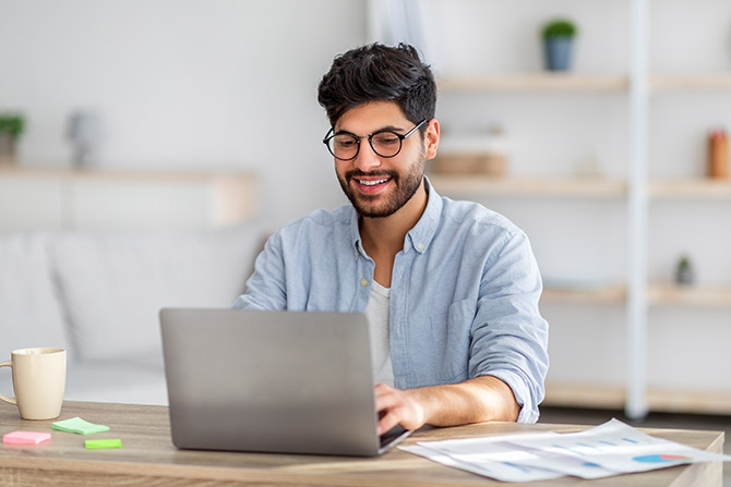 Young man using laptop