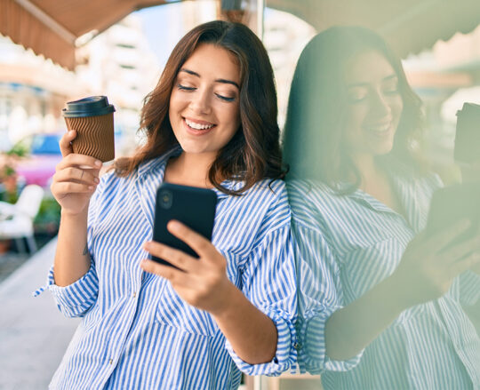 Woman holding mobile phone