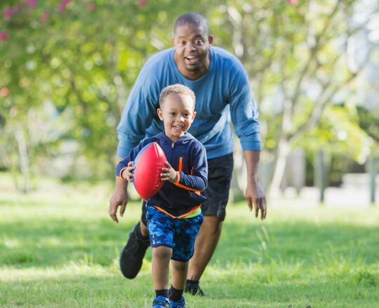 dad playing football