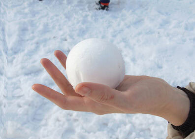 hand holding snowball