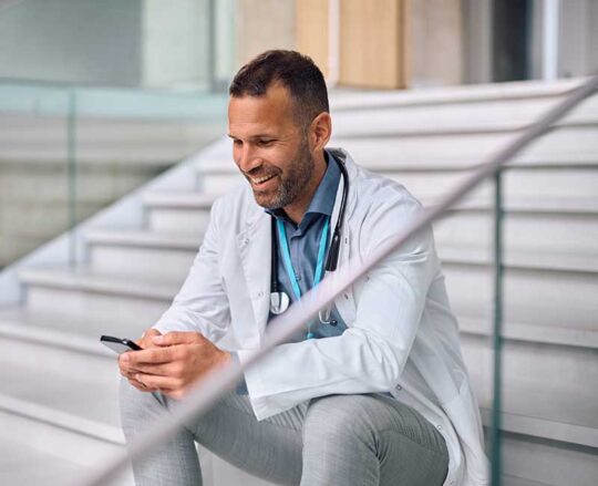 doctor sitting on stairs